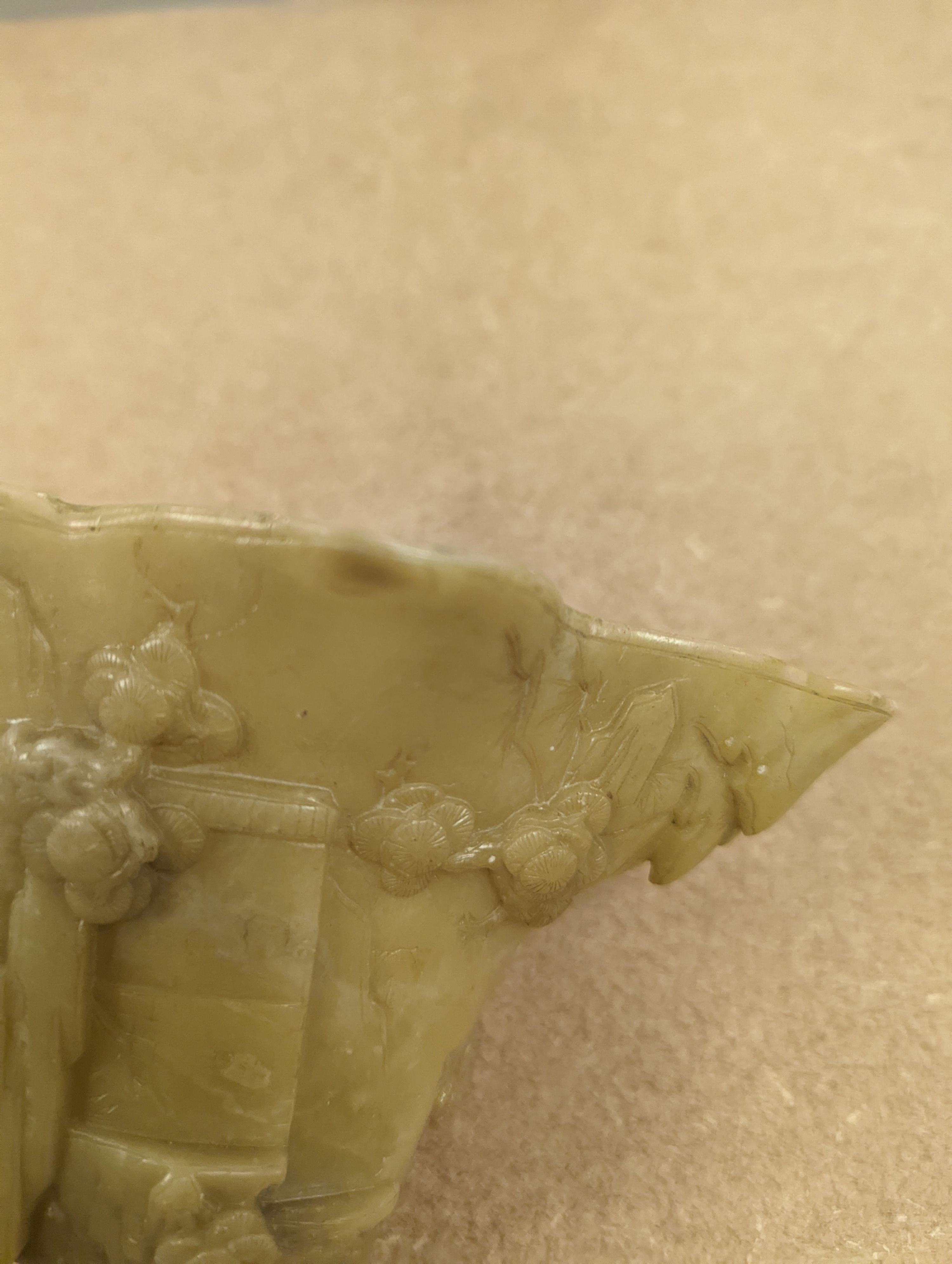 A Chinese carved soapstone libation cup, 19cm
